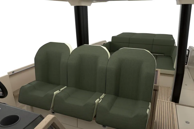 Slide: The Image of Interior seating of 2026 Aiata Sunfinder 50 boat, featuring green cushioned seats. - 12