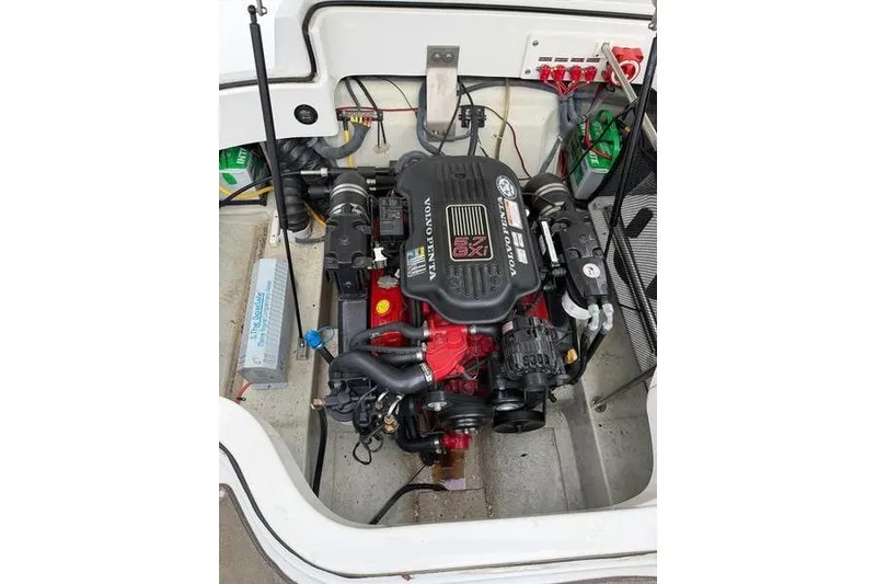 Slide: The Image of 2006 Cobalt 232 boat engine compartment with Volvo Penta engine, detailed view. - 25