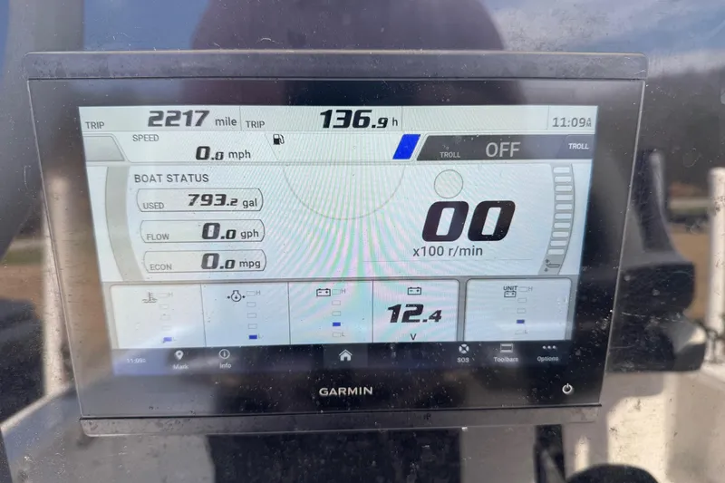 Slide: The Image of Garmin display on 2024 Tidewater 2410 Bay Max showing trip and boat status metrics. - 10