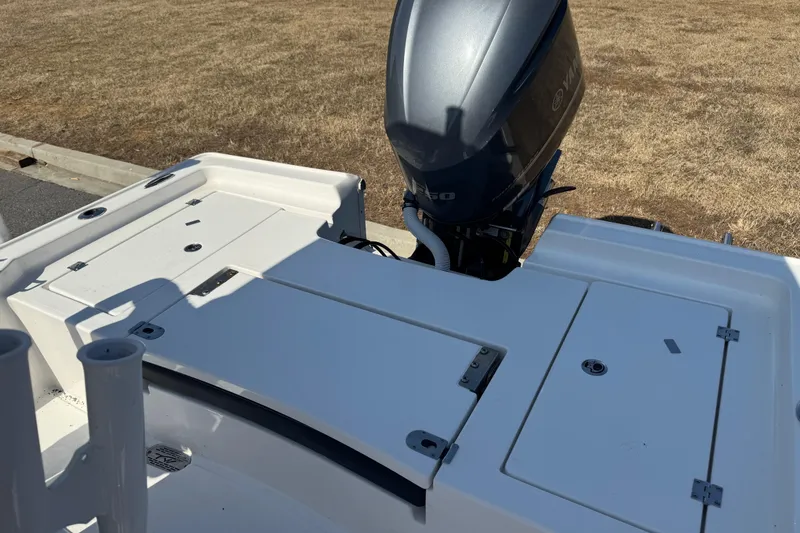 Slide: The Image of 2024 Tidewater 2410 Bay Max boat with Yamaha outboard motor, rear deck view. - 12