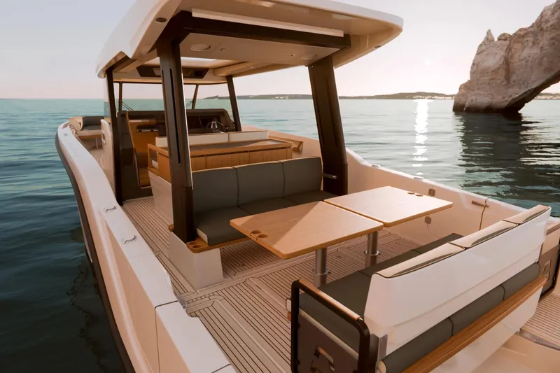 Slide: The Image of Luxurious Aiata Sunfinder 38 yacht, 2026 model, featuring elegant outdoor seating and scenic ocean view. - 2