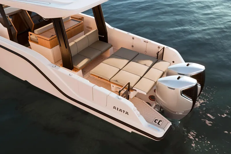Slide: The Image of 2026 Aiata Sunfinder 38 luxury boat with spacious seating and dual engines on calm water. - 3