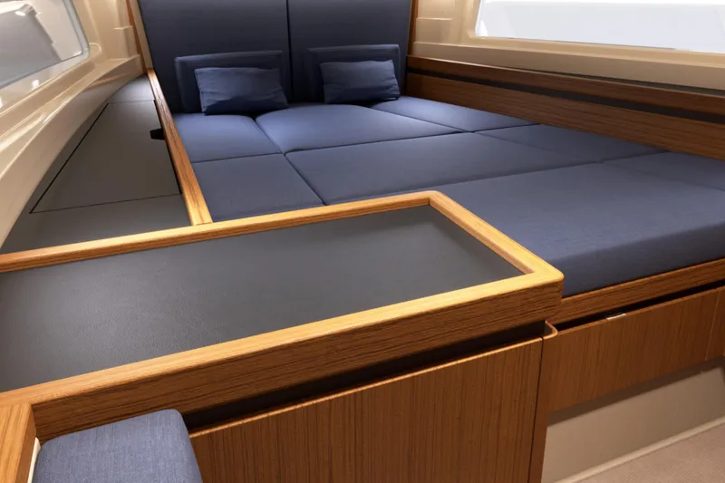 Slide: The Image of Luxurious interior of 2026 Aiata Sunfinder 38 yacht with elegant wood and blue upholstery. - 5