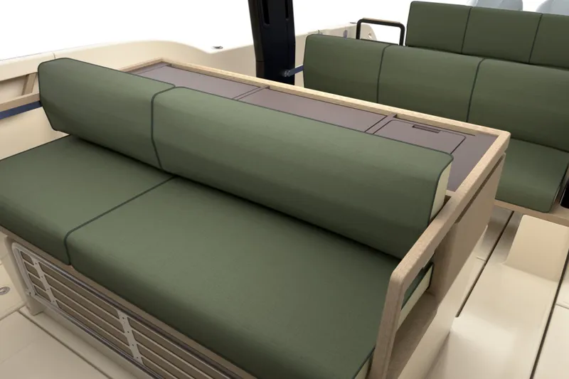 Slide: The Image of Interior seating of 2026 Aiata Sunfinder 38 boat with green cushions. - 6