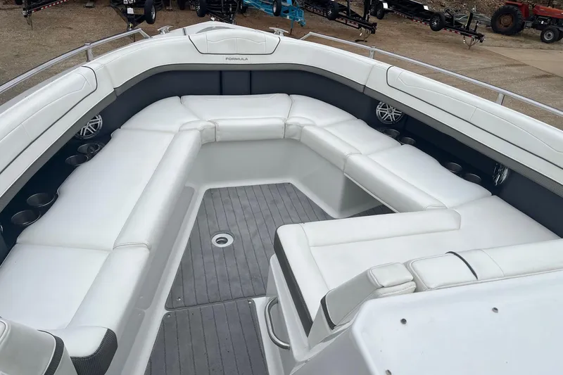 Slide: The Image of 2017 Formula 350 Crossover Bowrider with spacious white seating and modern design. - 14