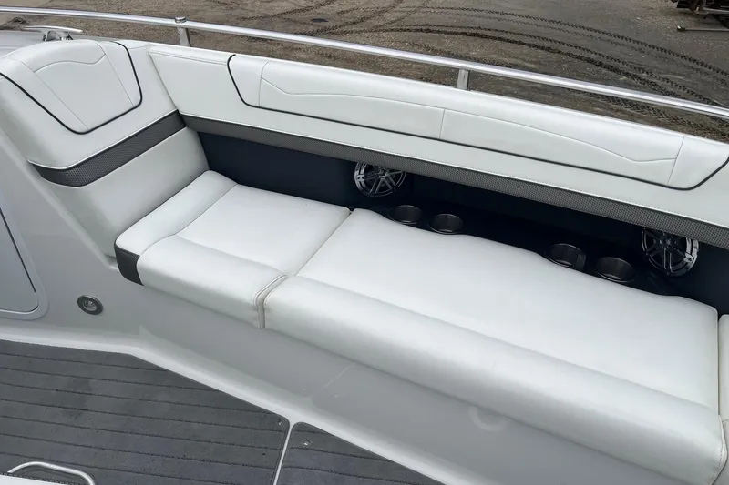Slide: The Image of 2017 Formula 350 Crossover Bowrider interior with white cushioned seating and cup holders. - 15