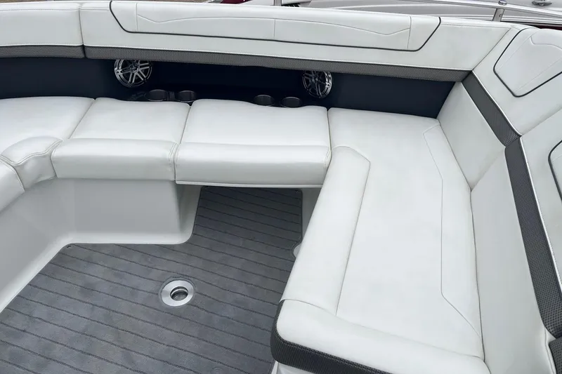 Slide: The Image of 2017 Formula 350 Crossover Bowrider interior with white seating and gray flooring. - 17