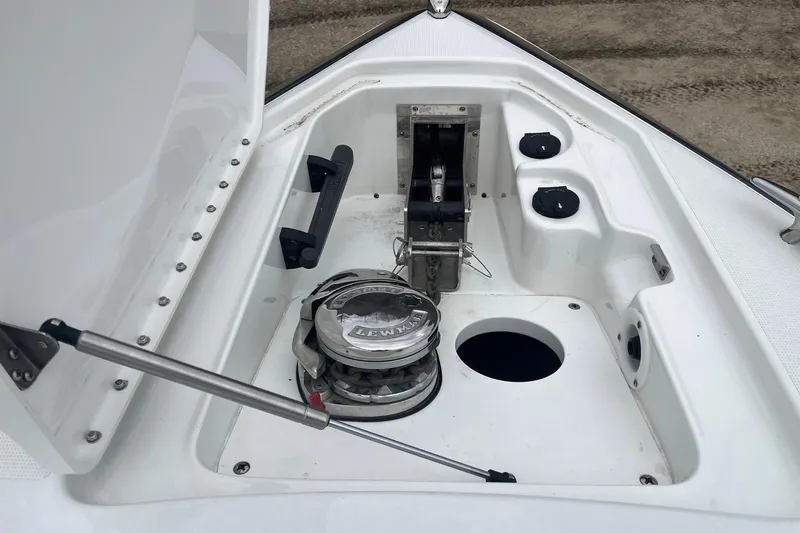 Slide: The Image of 2017 Formula 350 Crossover Bowrider anchor compartment with Lewmar windlass system. - 18