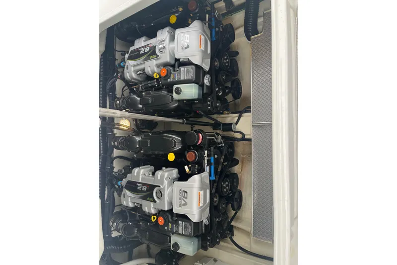 Slide: The Image of Twin engines in a 2017 Formula 350 Crossover Bowrider boat, showcasing powerful V8 design. - 23