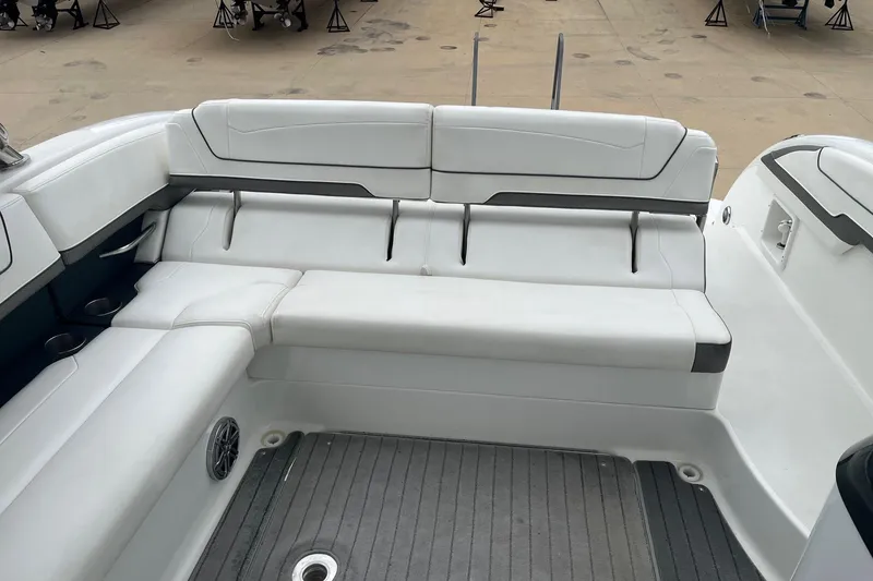 Slide: The Image of 2017 Formula 350 Crossover Bowrider interior with white seating and gray flooring. - 9