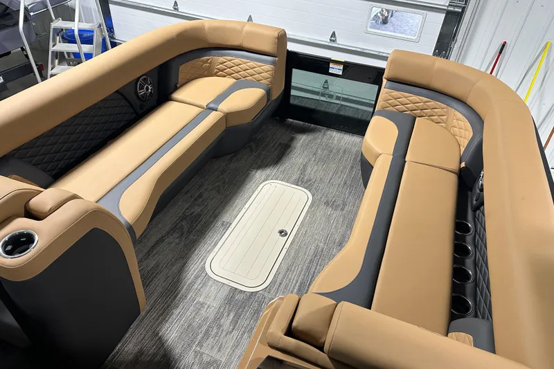 Slide: The Image of Luxurious seating and table setup on 2026 Godfrey Monaco 255 SB boat. - 13