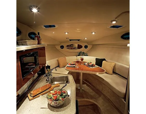 Slide: The Image of 2005 Regal Commodore 2765 boat on trailer under clear sky. - 3