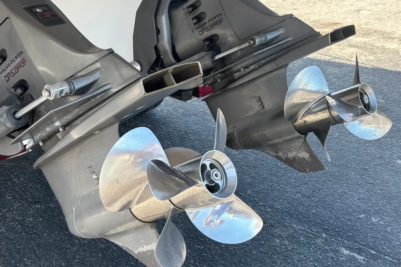 Slide: The Image of Dual propellers on a 2005 Regal Commodore 2765 boat, featuring Volvo Penta outdrives. - 8