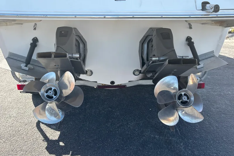 Slide: The Image of Rear view of 2005 Regal Commodore 2765 boat with dual propellers. - 9