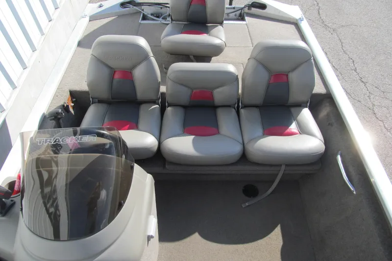 Slide: The Image of 1998 Tracker Pro Team 185 boat interior with gray and red seating. - 11