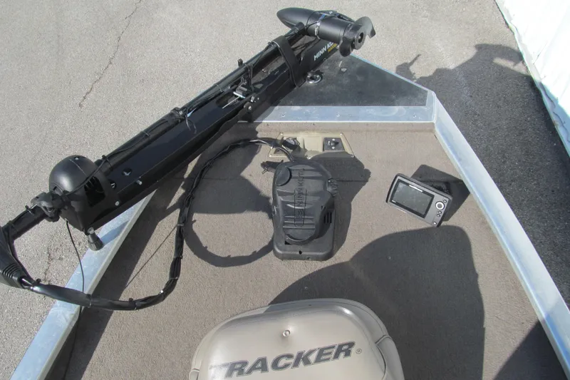 Slide: The Image of 1998 Tracker Pro Team 185 boat deck with trolling motor and fish finder. - 8