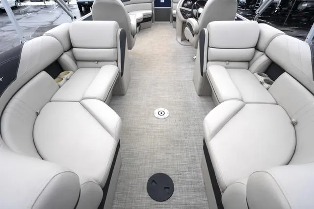 Slide: The Image of 2022 South Bay 222RS LE pontoon boat interior with plush seating and modern design. - 16