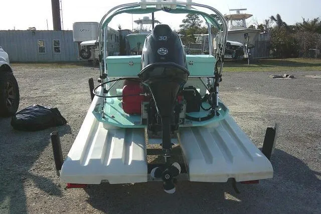 Slide: The Image of 2021 CraigCat E2 Elite on trailer, rear view, parked outdoors. - 8