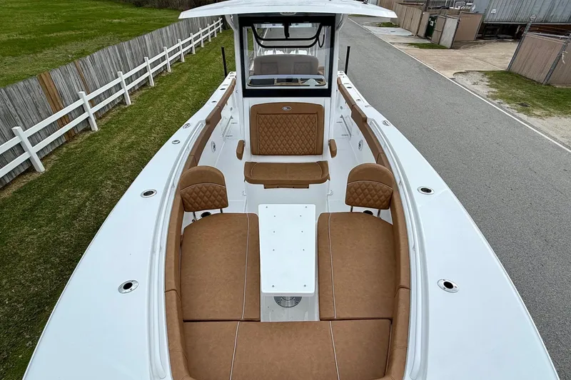 Slide: The Image of 2026 Sea Hunt Ultra 285 SE boat with spacious seating and elegant design. - 17