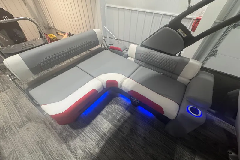 Slide: The Image of 2025 Avalon Catalina Cruise Rear Bench with Windshield, featuring modern upholstery and ambient lighting. - 15