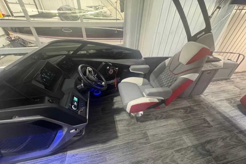 Slide: The Image of 2025 Avalon Catalina Cruise boat interior with modern helm and luxurious seating. - 17