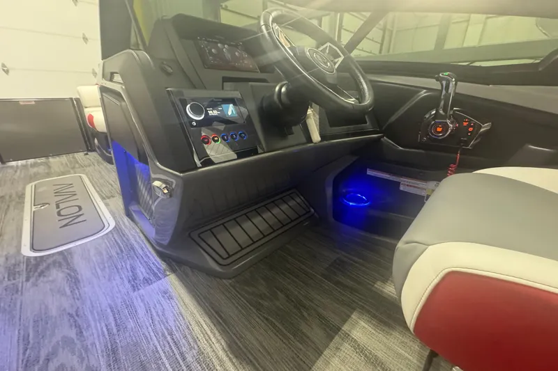 Slide: The Image of Interior of 2025 Avalon Catalina Cruise boat with modern dashboard and steering wheel. - 19