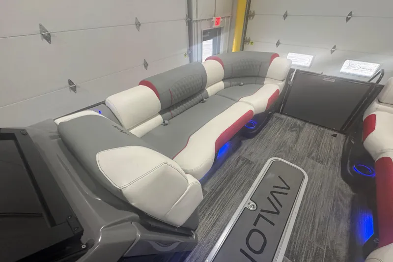 Slide: The Image of 2025 Avalon Catalina Cruise Rear Bench Windshield with stylish seating and ambient lighting. - 6