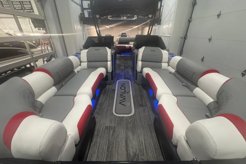 Slide: The Image of 2025 Avalon Catalina Cruise Rear Bench Windshield interior with luxurious seating and ambient lighting. - 8