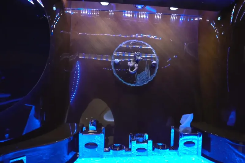 Slide: The Image of Luxurious interior of 1987 Magnum 70 Convertible with ambient blue lighting. - 27