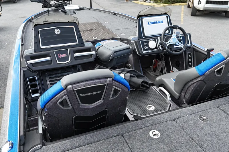Slide: The Image of 2025 Ranger Z521R boat interior with advanced navigation and seating. - 9