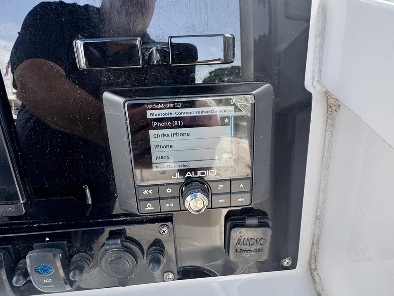 Slide: The Image of JL Audio MediaMaster 50 on 2022 Sea Hunt Ultra 275 SE boat dashboard. - 20