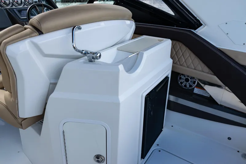 Slide: The Image of 2015 Cruisers Yachts 338 Bow Rider, beige and white seating, on water. - 19