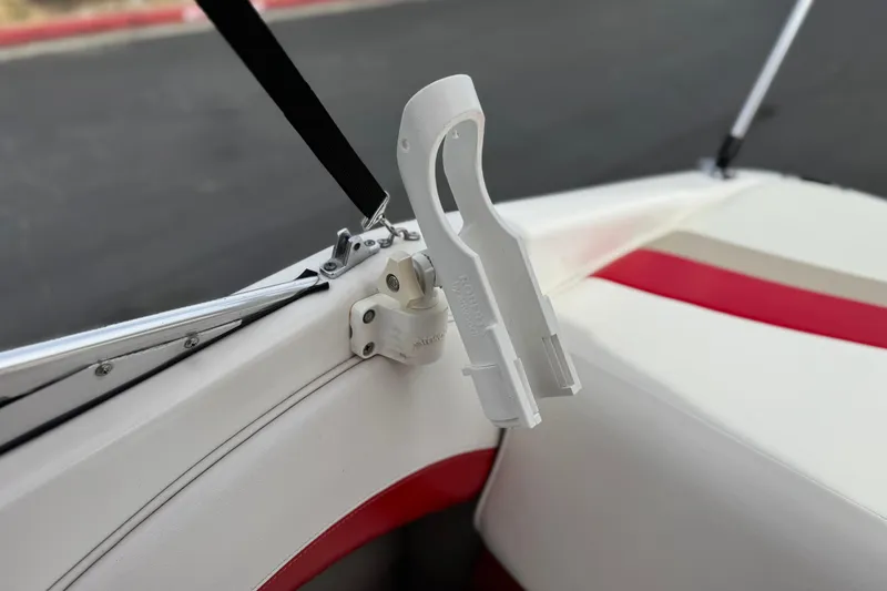 Slide: The Image of 2007 Ebbtide 180 SE boat interior with white and red seating detail. - 17