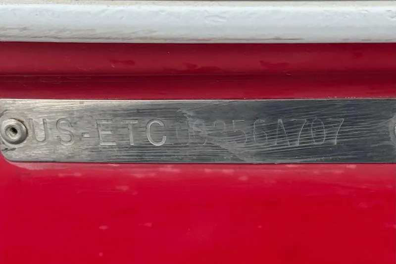 Slide: The Image of 2007 Ebbtide 180 SE boat hull identification number on red surface. - 27