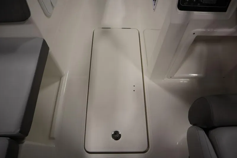 Slide: The Image of 2024 Bayliner 2050 DX interior floor storage compartment. - 32