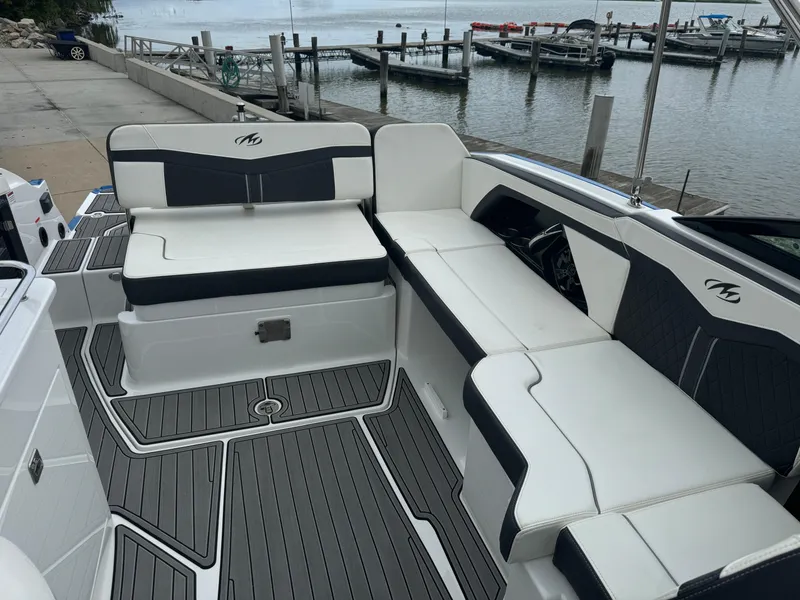 Slide: The Image of 2018 Monterey 258 Super Sport boat interior with sleek seating and modern design. - 10