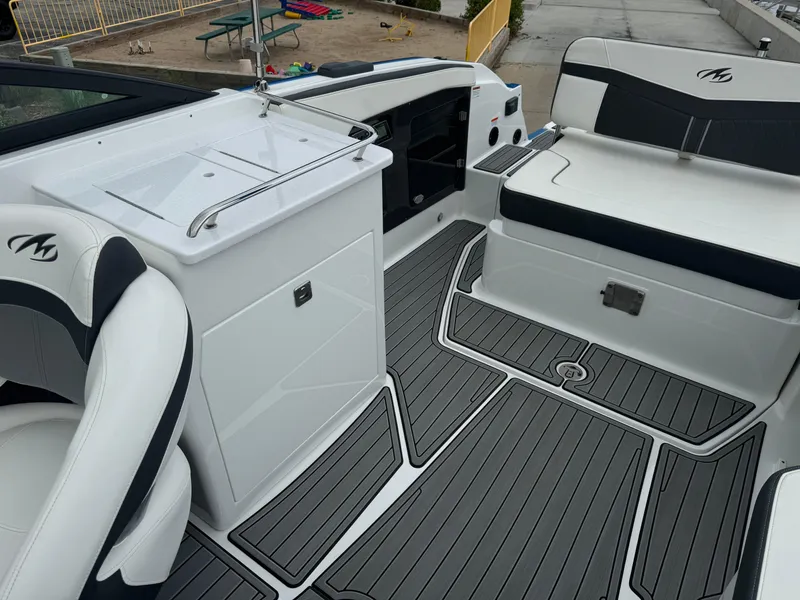 Slide: The Image of 2018 Monterey 258 Super Sport boat interior with sleek seating and modern design. - 11