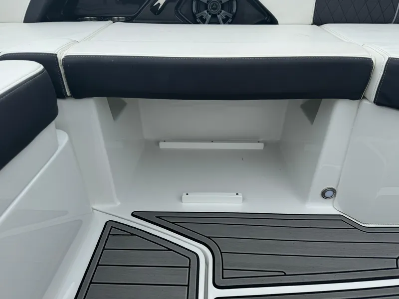 Slide: The Image of 2018 Monterey 258 Super Sport boat interior seating and flooring detail. - 12