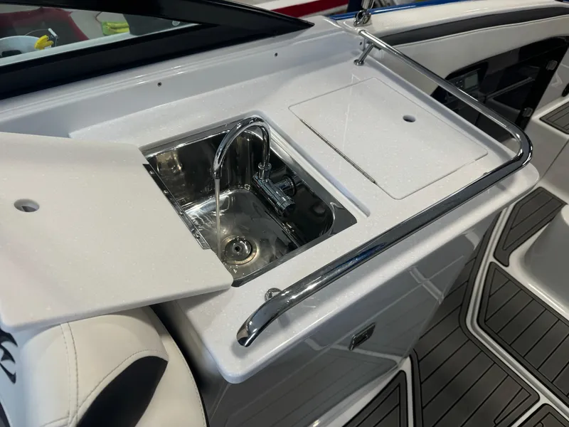 Slide: The Image of 2018 Monterey 258 Super Sport boat sink and countertop detail. - 14