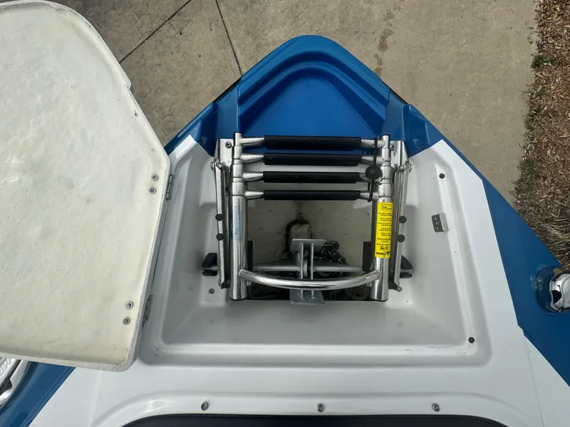 Slide: The Image of 2018 Monterey 258 Super Sport boat ladder and anchor compartment. - 32