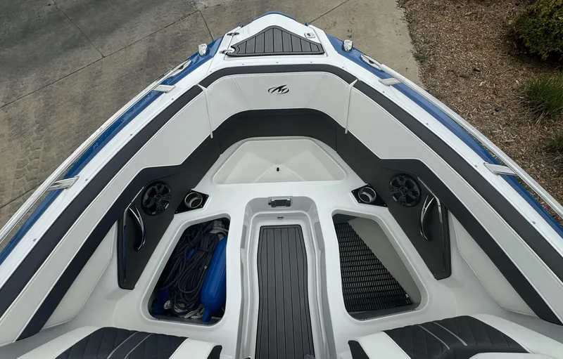 Slide: The Image of 2018 Monterey 258 Super Sport boat interior with seating and storage compartments. - 34