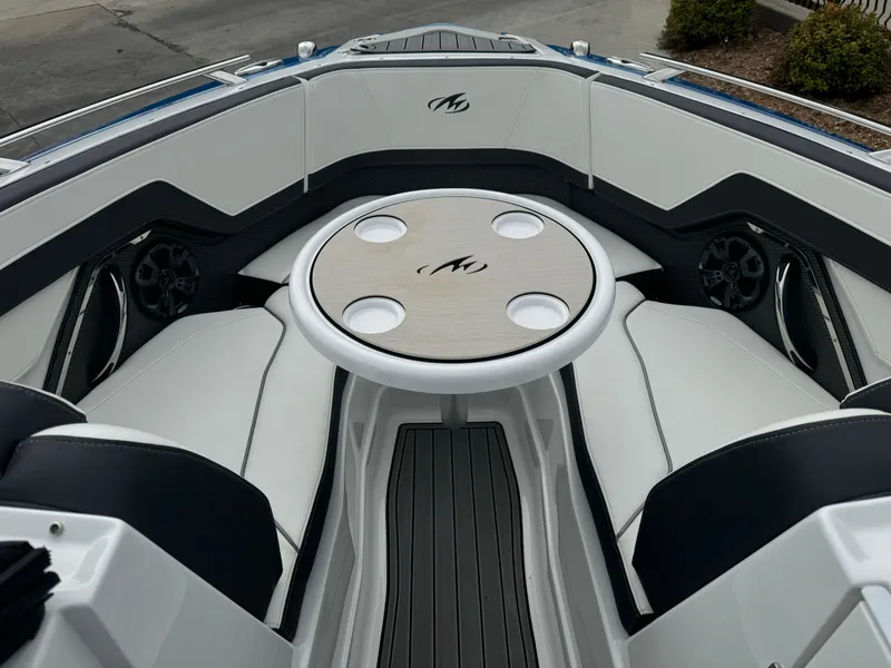 Slide: The Image of 2018 Monterey 258 Super Sport boat interior with seating and table. - 35