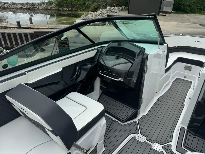 Slide: The Image of 2018 Monterey 258 Super Sport boat interior with sleek seating and modern dashboard design. - 42