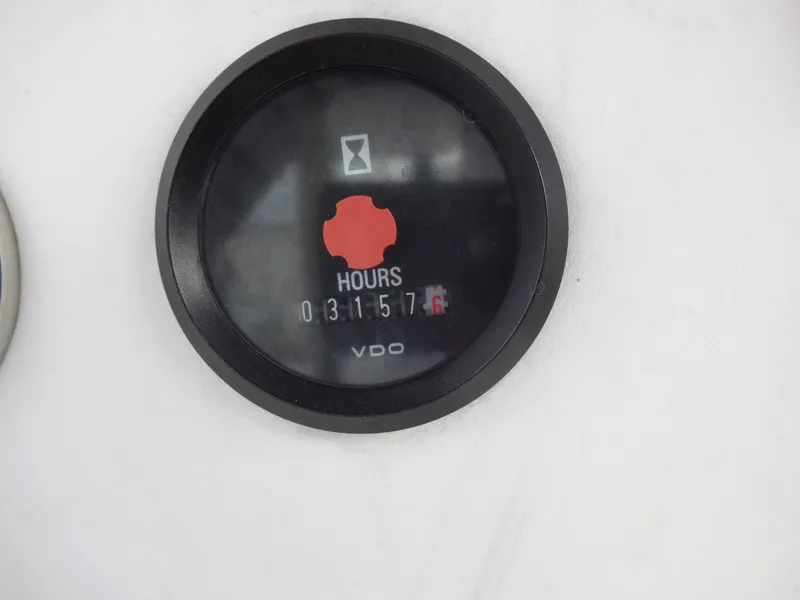 Slide: The Image of Hour meter of a 2003 Lagoon 410 showing 3157.6 hours. - 27