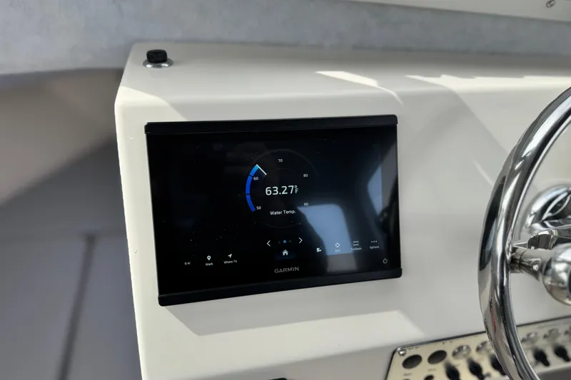 Slide: The Image of Garmin display on 2023 Defiance 220 Admiral EX boat showing water temperature. - 28