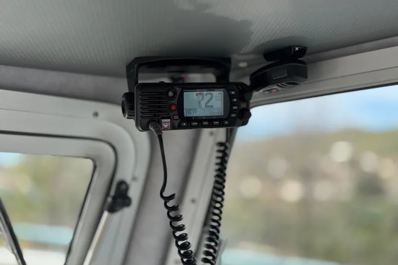 Slide: The Image of VHF radio installed in 2023 Defiance 220 Admiral EX boat cabin. - 33