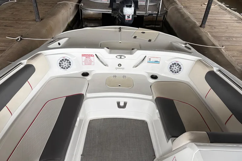 Slide: The Image of Interior of a 2021 Tahoe 1950 boat with seating and speakers. - 3