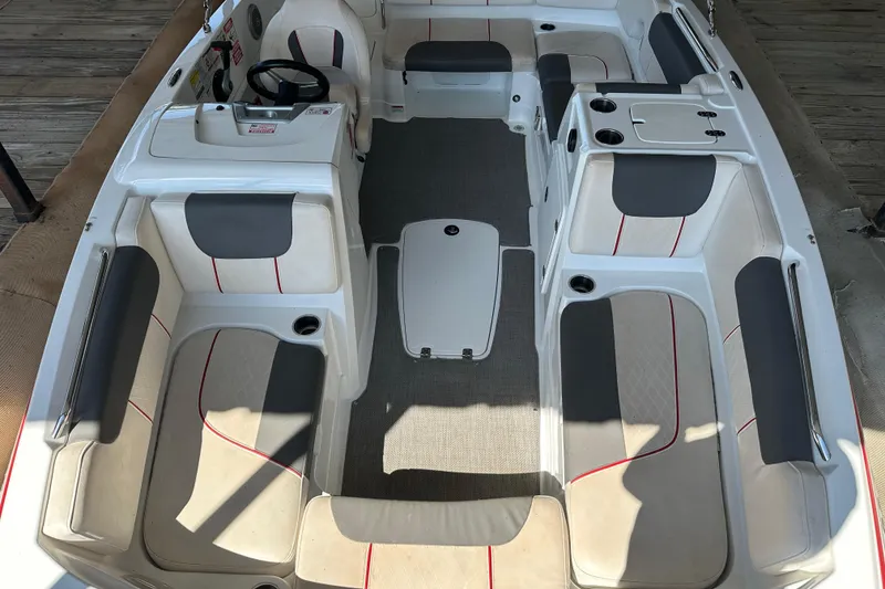 Slide: The Image of Interior view of a 2021 Tahoe 1950 boat with spacious seating and modern design. - 4