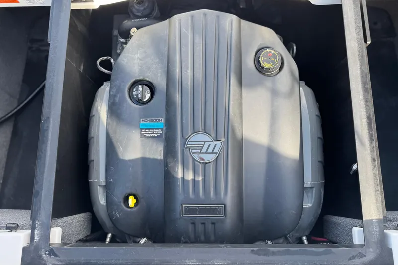 Slide: The Image of 2023 Malibu Wakesetter 21 LX engine compartment with Monsoon engine. - 23