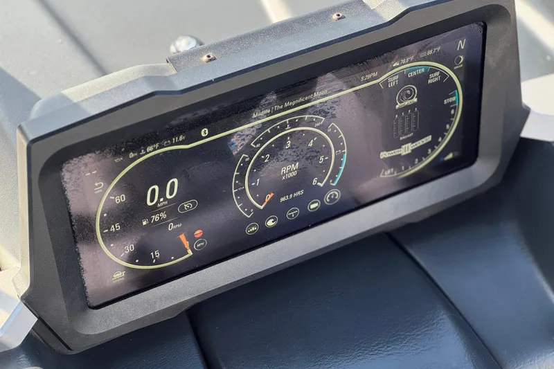 Slide: The Image of 2023 Malibu Wakesetter 21 LX dashboard display showing speed, RPM, and surf settings. - 32